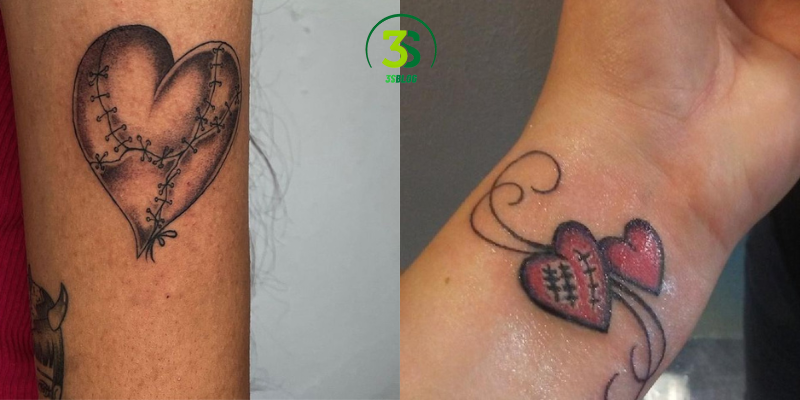 small broken heart with stitching tattoo on wrist