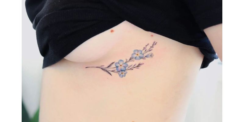 Minimalist Blue Floral Tattoos