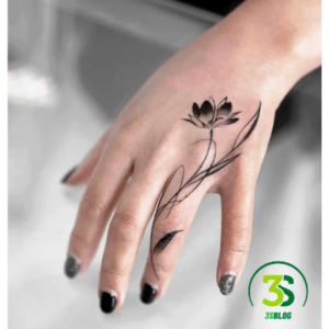 Small flower tattoos on fingers